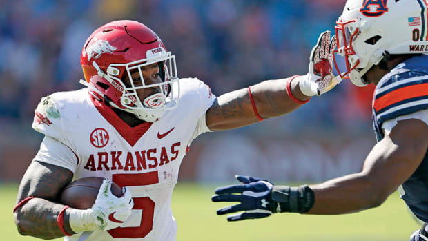Arkansas Razorbacks running back Raheim Sanders gets ready to block Auburn Tigers linebacker Owen Pappoe during the third quarter at Jordan-Hare Stadium.
